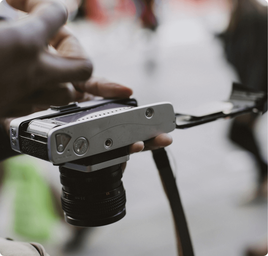 The back of a film camera being opened
